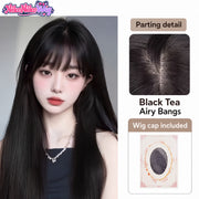 Black Tea long straight wig with airy bangs, parting detail and included wig cap; supplier model reference